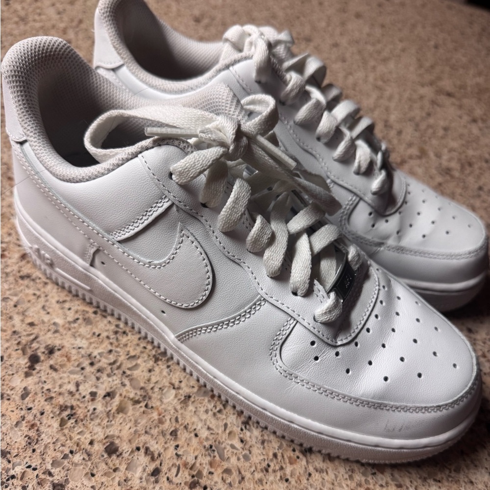 Nike White Air Force 1 ‘07 Sneakers (Women’s 8.5 or Men’s 7)